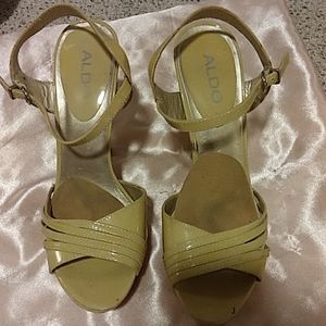 Beige Aldo heels 5 3/4" tall.